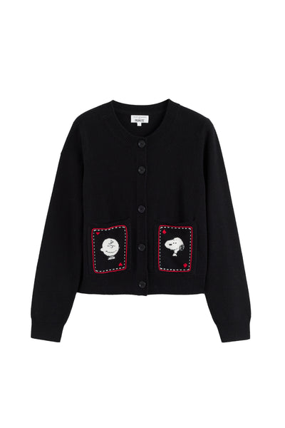 Black cardigan with embroidered patches on a white background