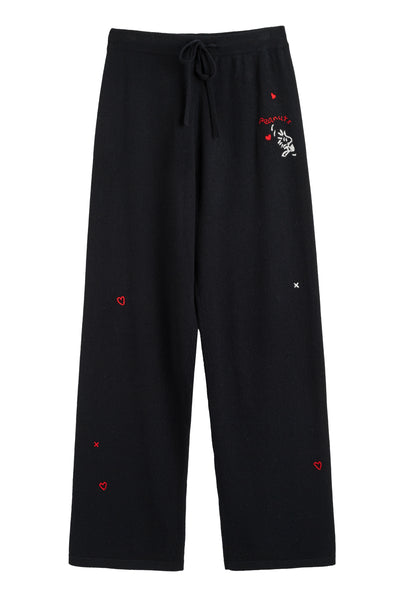 Black pants with red heart and flower embroidery on a white background