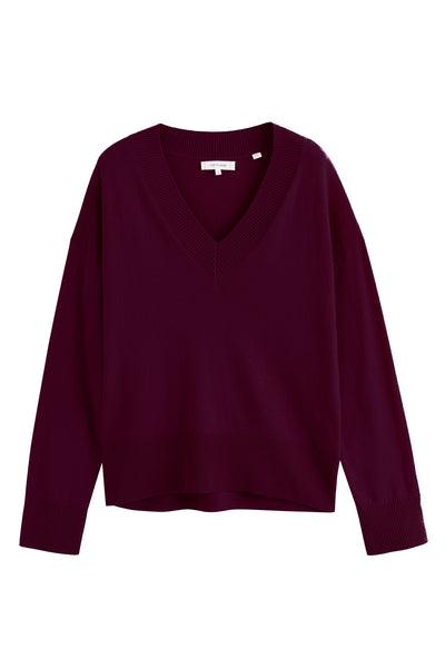 Maroon sweater on a white background