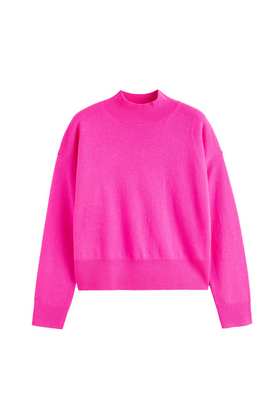 Pink sweater on a white background