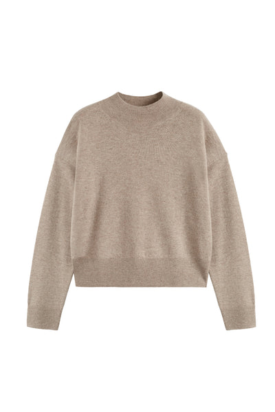Beige sweater on a white background