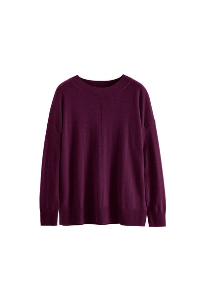 Purple sweater on a white background