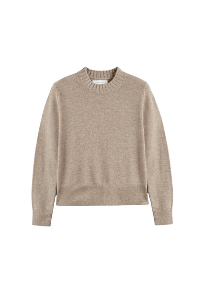 Beige sweater on a white background