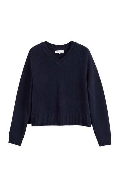 Navy blue sweater on a white background