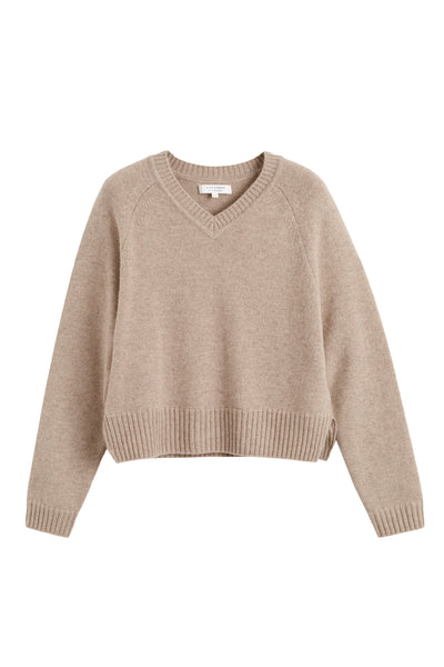 Beige sweater on a white background