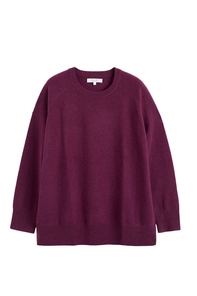 Purple sweater on a white background