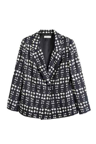 Navy blazer with white floral pattern on a white background
