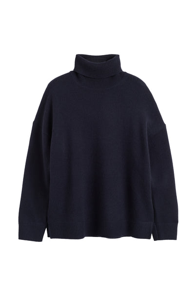 Navy blue turtleneck sweater on a white background