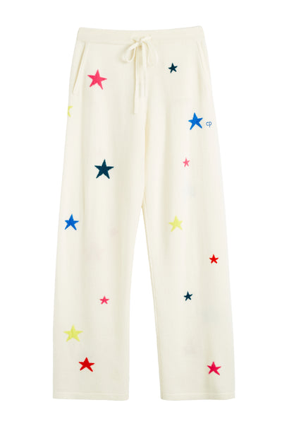 White pants with colorful star patterns on a white background
