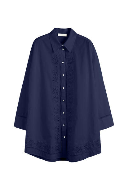 Navy blue shirt with floral embroidery on a white background