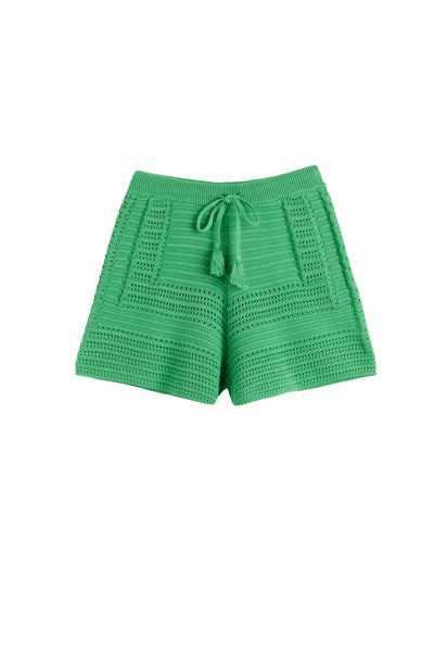 Green crochet shorts on a white background