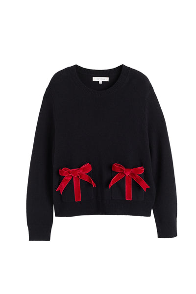 Black sweater with red bows on a white background