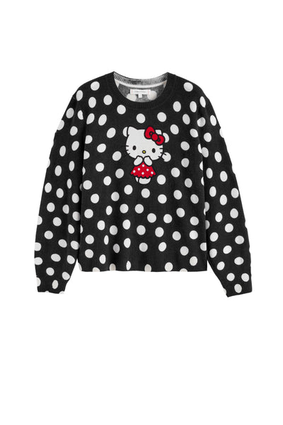 Black polka dot sweater with Hello Kitty design on a white background