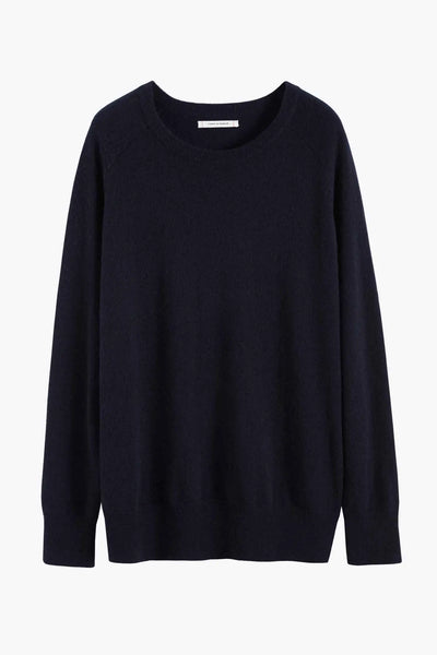 Navy blue sweater on a white background
