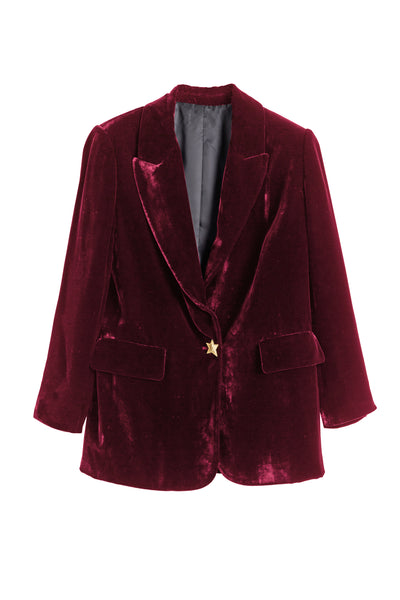 Maroon velvet blazer with a gold button on a white background