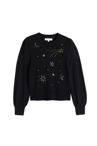 Black sweater with celestial designs on a white background