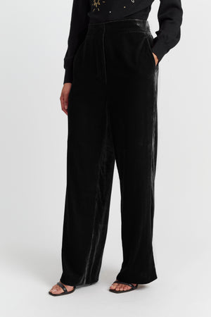 black-laura-whitmore-velvet-trousers