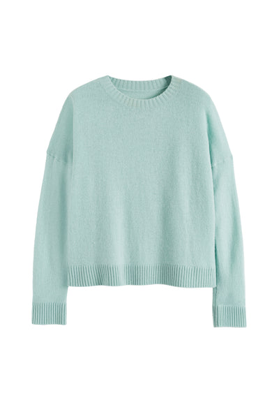 Light blue sweater on a white background