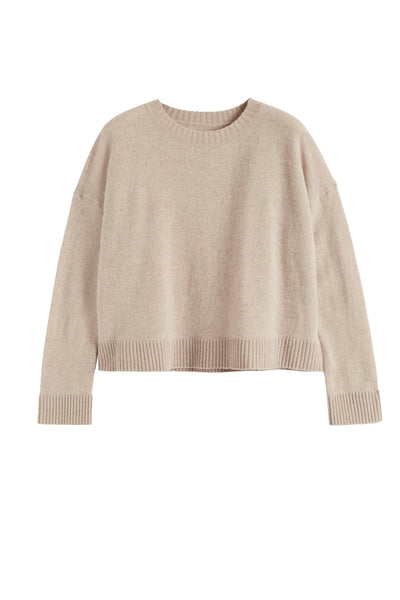 Beige sweater on a white background