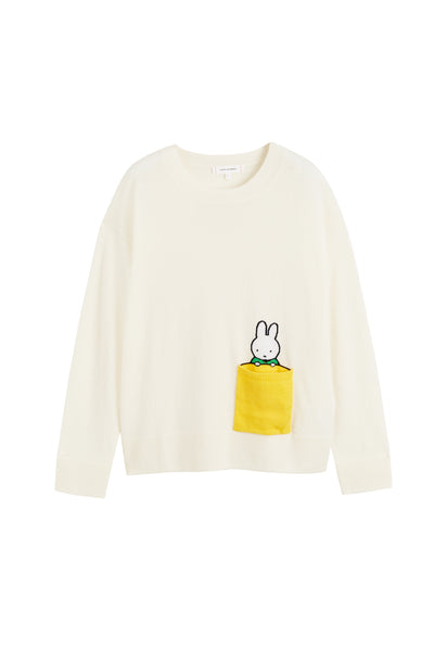 White sweater with a cartoon character design on a white background