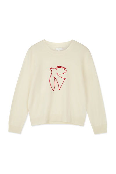 White sweater with red graphic design on a white background