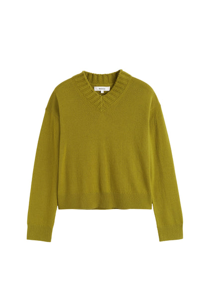 Green sweater on a white background